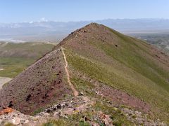 09D Looking back at the shoulder ridge 4000m of Pik Petrovski and the plain with mountains beyond on day hike from Ak-Sai Travel Lenin Peak Base Camp 3600m