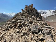 10B A rock tower blocked the way on the shoulder ridge at 4000m of Pik Petrovski with Pik Petrovski beyond on day hike from Ak-Sai Travel Lenin Peak Base Camp 3600m