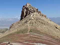 10C Looking back at the rock tower with the trail to the right on the shoulder ridge at 4000m of Pik Petrovski on day hike from Ak-Sai Travel Lenin Peak Base Camp 3600m