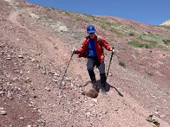 12A Descending the loose scree slope from the Pik Petrovski shoulder ridge saddle at 4000m on day hike from Ak-Sai Travel Lenin Peak Base Camp 3600m