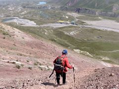 12B Descending the loose scree slope from the Pik Petrovski shoulder ridge saddle at 4000m toward Ak-Sai Travel Lenin Peak Base Camp 3600m