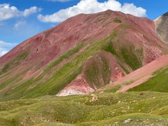 06A Bright red slope of ITMO University Peak in the late afternoon from Ak-Sai Travel Lenin Peak Base Camp 3600m