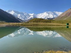 10 Early morning reflection in a small lake of Peak of the 19th Party Congress of the CPSU, Unity Peak, Pik Spartak and Lenin Peak at Ak-Sai Travel Lenin Peak Base Camp 3600m