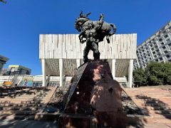 11A Statue of Baatyr Kaba Uulu Kozhomkul in front of the Palace of Sports Bishkek Kyrgyzstan