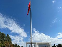 16B Two guards with a large Kyrgyz flag and the Kyrgyz State History Museum Bishkek Kyrgyzstan