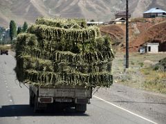 07B A truck overloaded with hay on the Pamir Highway between Chirchik Pass and Taldyk Pass on the way to Lenin Peak Base Camp