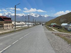 14A The Pamir Highway after leaving Sary Tash with the broad snow-capped Trans-Alay Mountain Range beyond on the way to Lenin Peak Base Camp