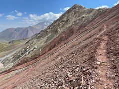 07B Many zig zag trails lead up to Travellers Puteshestvennikov Pass 4133m ahead on the way to Ak-Sai Travel Lenin Peak Camp 1 4400m