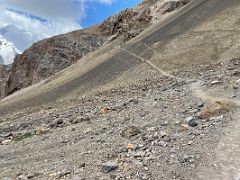 10B The trail ascends slowly toward the river crossing on the way to Ak-Sai Travel Lenin Peak Camp 1 4400m