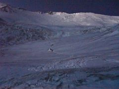 05A The first part of the climb from crampon point is gentle in the pre-dawn light on the way to Ak-Sai Travel Lenin Peak Camp 2 5400m