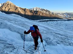 06B Crossing a small ladder as the route nears crevasses on the way to Ak-Sai Travel Lenin Peak Camp 2 5400m