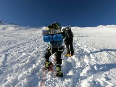 09B Lal Sing Tamang leads the way up the slopes of Lenin Peak as we climb toward Ak-Sai Travel Lenin Peak Camp 2 5400m