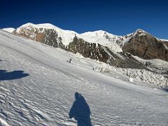 09C Looking across at Peak 5688 above camp 2 and Peak of the 30th Anniversary of the USSR climbing the slopes of Lenin Peak on the way to Ak-Sai Travel Lenin Peak Camp 2 5400m