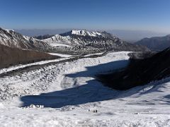 10B Looking back at Lenin Glacier, camp 1 and Pik Petrovski from the slopes of Lenin Peak on the way to Ak-Sai Travel Lenin Peak Camp 2 5400m