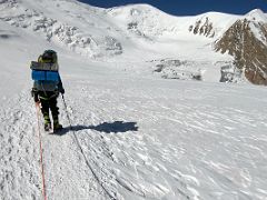 12B The long generally flat traverse to Ak-Sai Travel Lenin Peak Camp 2 5400m with Razdelnaya Peak above centre