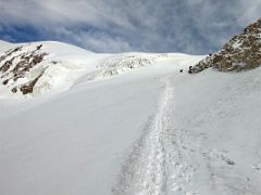 02B The route climbs gently at first after leaving camp 2 5400m on the way to Ak-Sai Travel Lenin Peak Camp 3 6100m