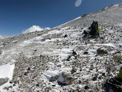 04 A lone climber descends as we ascent on the climb towards Lenin Peak camp 4 6430m