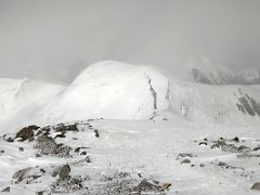 05A The clouds roll in as I look back at Camp 3 on Razdelnaya Peak as the climb nears Lenin Peak camp 4 6430m