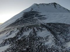 01B Looking at the steep climb just ahead in the dawn light after leaving camp 4 6430m on the way to the Lenin Peak summit