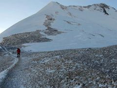 03A Lal Sing Tamang leads the way to the steep climb after leaving camp 4 6430m on the way to the Lenin Peak summit