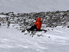 09C Taking a break at about 7000m on the way to Lenin Peak summit 7134m