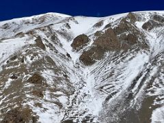 03B The trail to the summit comes in from the left with the summit of Yuhin Peak 5100m on the left on the way from Ak-Sai Travel Lenin Peak Camp 1 4400m