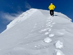 06A Lal Sing Tamang breaks trail in the overnight snow the last 10m to the summit of Yuhin Peak 5100m near Ak-Sai Travel Lenin Peak Camp 1 4400m