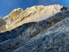 07B The final rays of sunset on Lobuche Peak close up from Lobuche East Base Camp 5170m