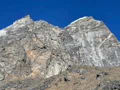 02C The sheer rock face of Lobuche Peak 6119m from the top of the hill behind Lobuche on the way to Lobuche East Base Camp