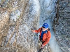 06A Preparing to climb a steep section of rocks with a hand rope for safety on the way to Lobuche East Base Camp