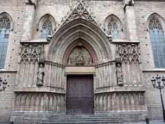 01C The tympanum over the entrance has a widened Catalan Gothic arch Basilica of Santa Maria del Mar Barcelona Spain