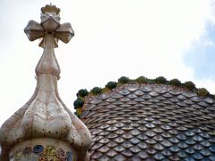 02B A tower on the roof has a cross of four arms and a bulbous, root-like structure that evokes plant life Antoni Gaudi Casa Batllo Barcelona Spain