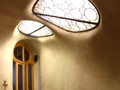 03D Wooden carved stairs with decorative windows and doors Casa Batllo Gaudi Barcelona Spain