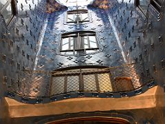 11A The Central Lightwell Has decorative blue tiles Casa Batllo Gaudi Barcelona Spain