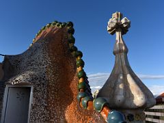 15A A tower with a cross of four arms, the arched profile like the spine of a dragon Roof Terrace Casa Batllo Gaudi Barcelona Spain