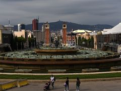 01C The magic fountain of Montjuic designed by Carles Buigas, was constructed in 1929 with the Venetian Towers behind Museu Nacional d Art de Catalunya Barcelona Spain