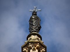 10B St Eulalia Statue on top of the main spire from behind on the roof of the Barcelona Cathedral Spain