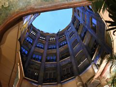 04A Looking up at the building from the Flower Courtyard with floral motifs La Pedrera Casa Mila Gaudi Barcelona Spain