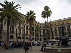 11A Placa Reial Royal Plaza was erected in mid-19C and has palm trees and a fountain near La Rambla Barcelona Spain