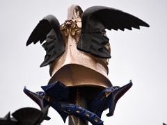 12D The Gaudi street light lamp post in Placa Reial Royal Plaza is crowned by a Caduceus with two snakes and a winged helmet, representing Mercury near La Rambla Barcelona Spain