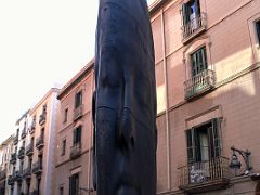 03 Carmela sculpture by Jaume Plensa is an enigmatic flattened sculpture Outside The Palau de la Musica Catalana Barcelona Spain