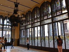 11A Lluis Millet Hall is two storeys high with stained glass windows decorated with floral designs Palau de la Musica Catalana Barcelona Spain