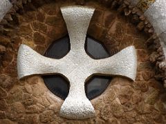 08C Casa del Guarda Porters Lodge window with a white cross pattee Park Guell Barcelona Spain