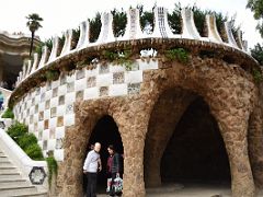 11B A grotto at the bottom right of the entrance steps was used as waiting shelter supported by a conical central column Park Guell Barcelona Spain