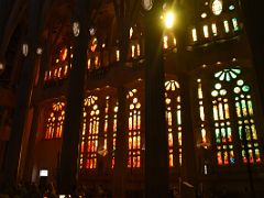 21A The west stained glass windows have reds, oranges and yellows Sagrada Familia Barcelona Spain