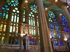 22A The stained glass windows on the east side of the church have blues and greens Sagrada Familia Barcelona Spain