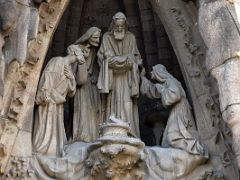 03A Presentation of Jesus in the temple Faith portico Nativity facade Sagrada Familia Barcelona Spain