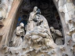 04A The coronation of Mary by Jesus with Saint Joseph Charity portico Nativity facade Sagrada Familia Barcelona Spain