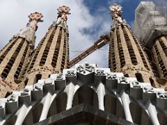 05C Passion Facade towers are topped with trencadis mosaics Passion facade Sagrada Familia Barcelona Spain