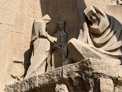 08A Denial of St Peter - the 3 women and the cockerel represent the 3 times that he denied knowing Christ before the sun rose Passion facade Sagrada Familia Barcelona Spain